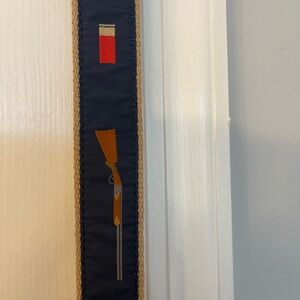 Shotgun and shotgun shells belt.